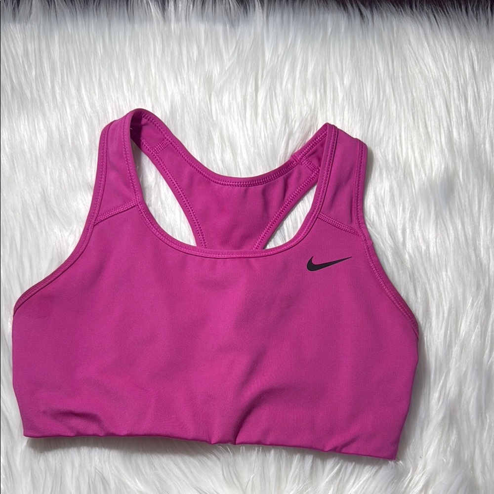 Nike Pink Sports Bra with Racerback Design and Moisture-Wicking Fabric